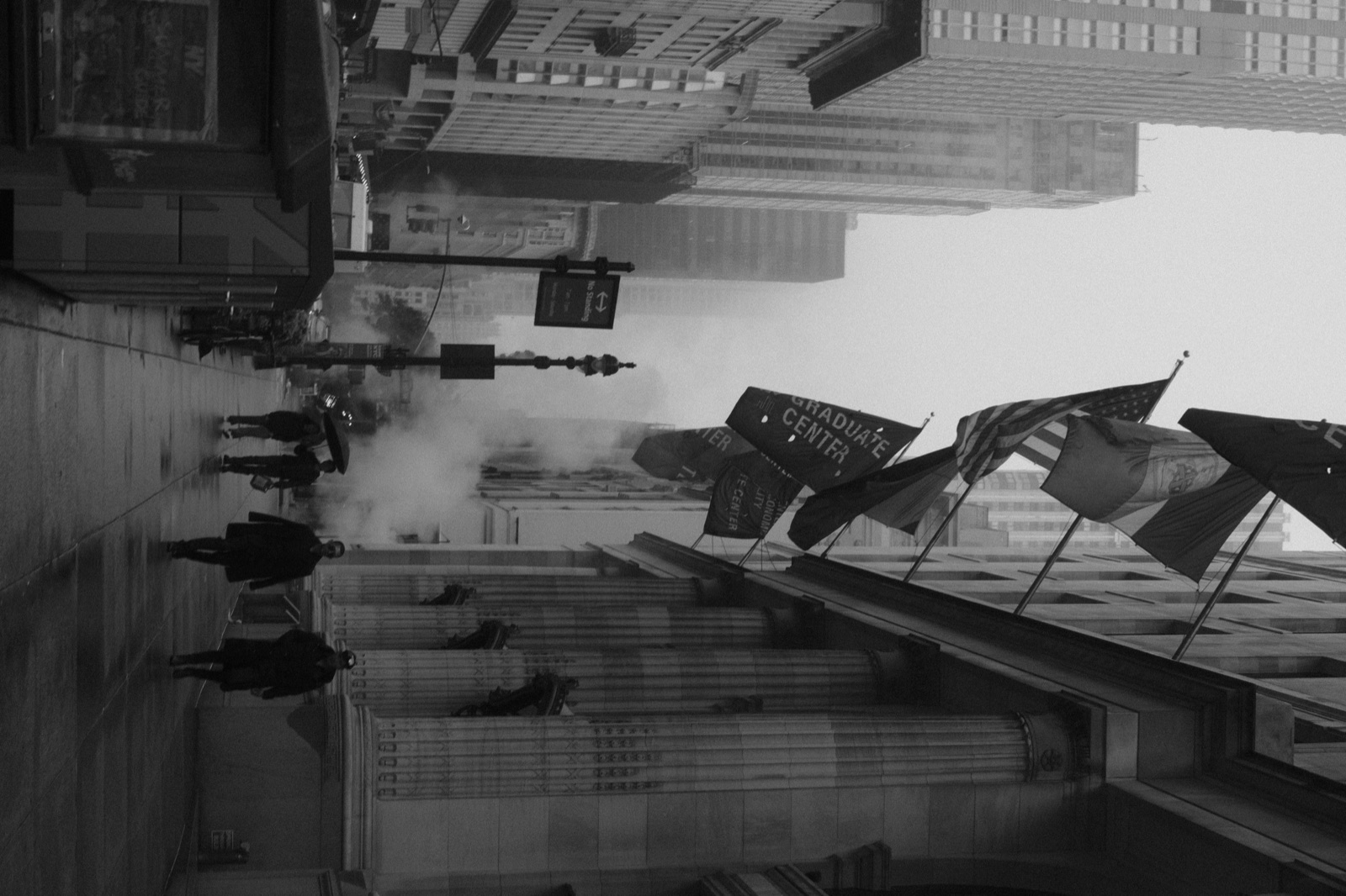 Steam rising on a Manhattan street, black and white
