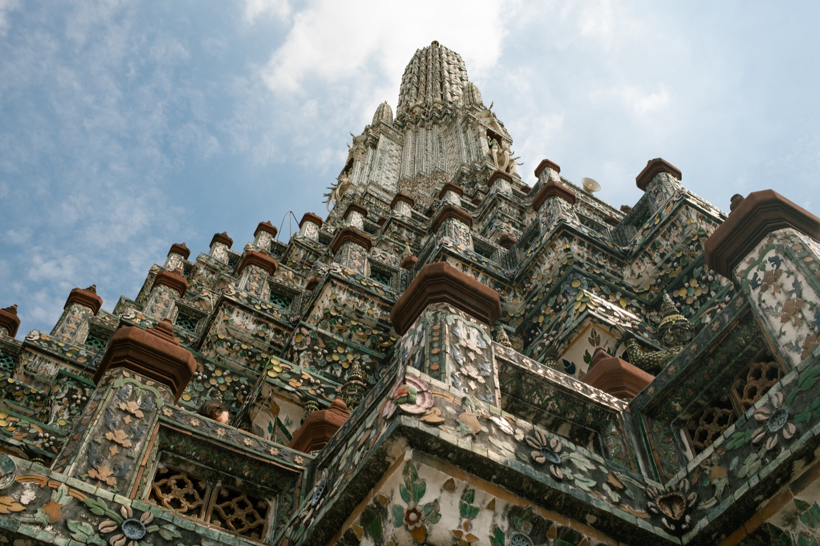 The spire of Wat Arun against the sky, Bangkok